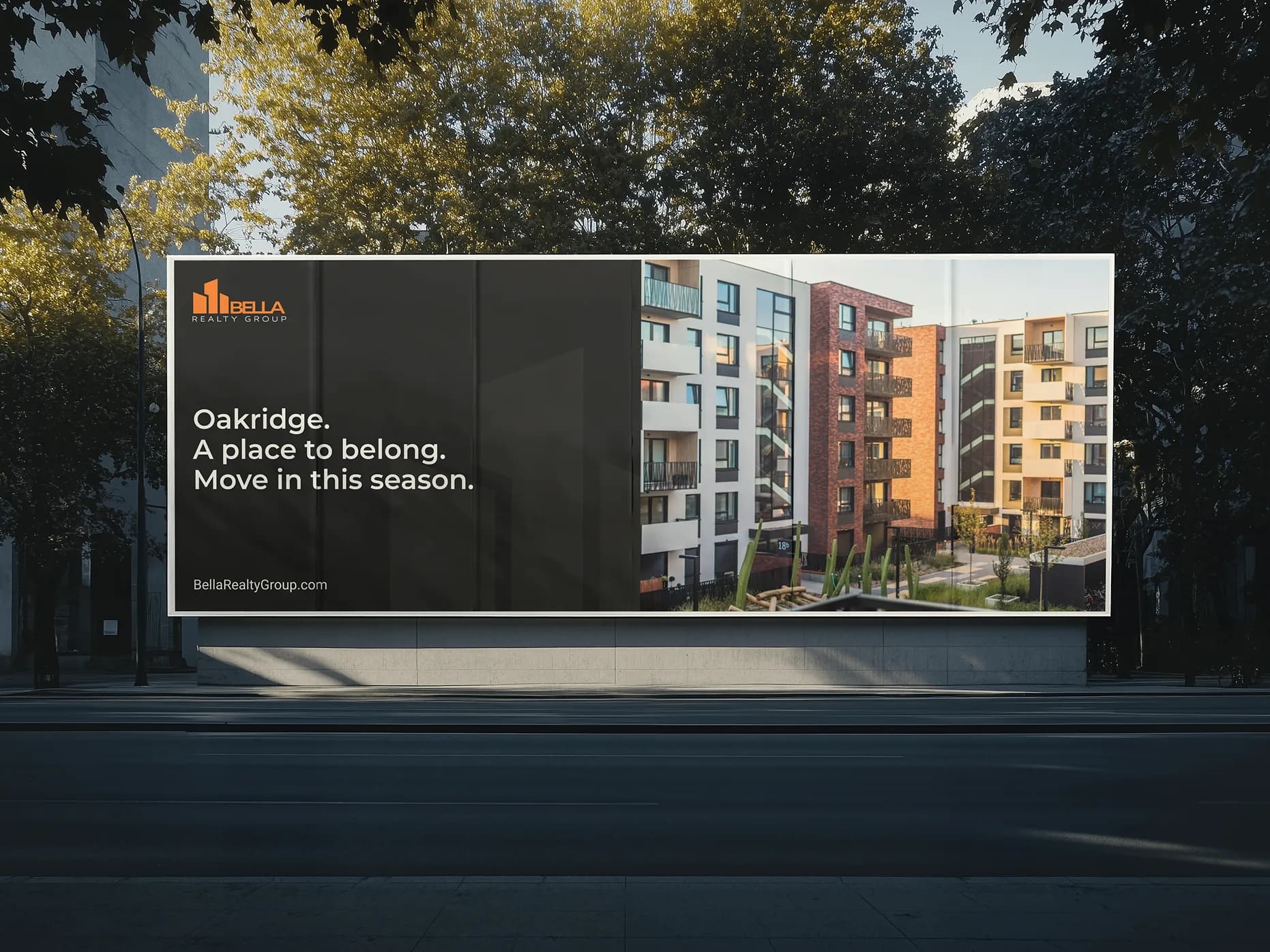 A Bella Realty Group billboard advertising the Oakridge apartment community